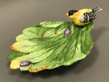 Goldfinch on leaves